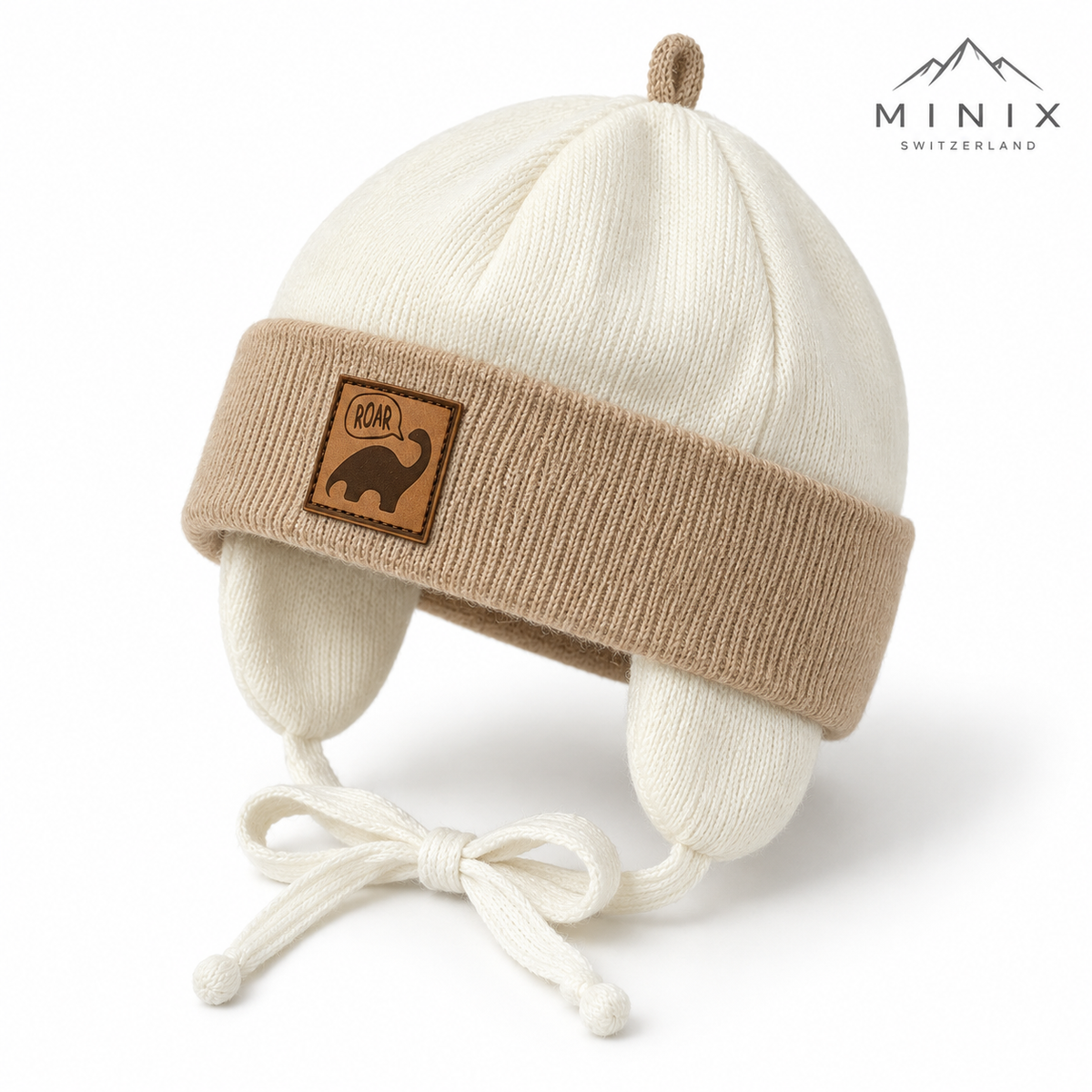 Close-up of the ROAR dinosaur leather-look patch on the beige knitted cuff