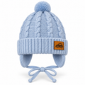 Light blue cable-knit baby boy cap with pompom, car patch, ear flaps and tie strings – front view