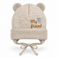 Beige knitted baby cap with bear ears, "My friend" lettering and ribbed cuff – front view