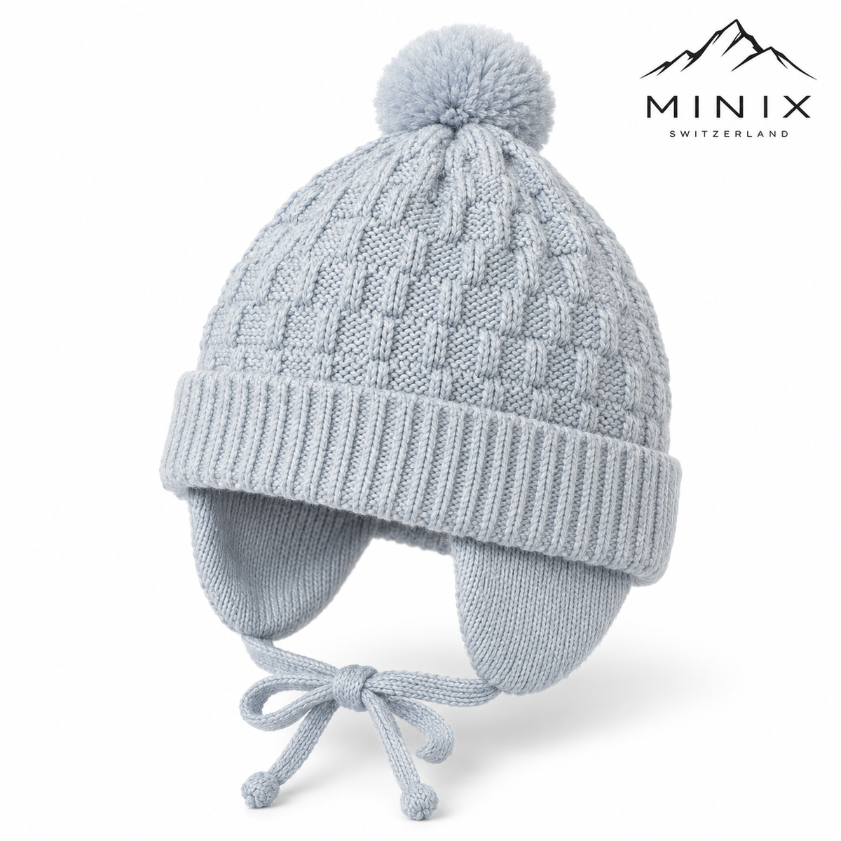 Light blue basketweave knit baby boy cap with pompom and bow ties – angled view