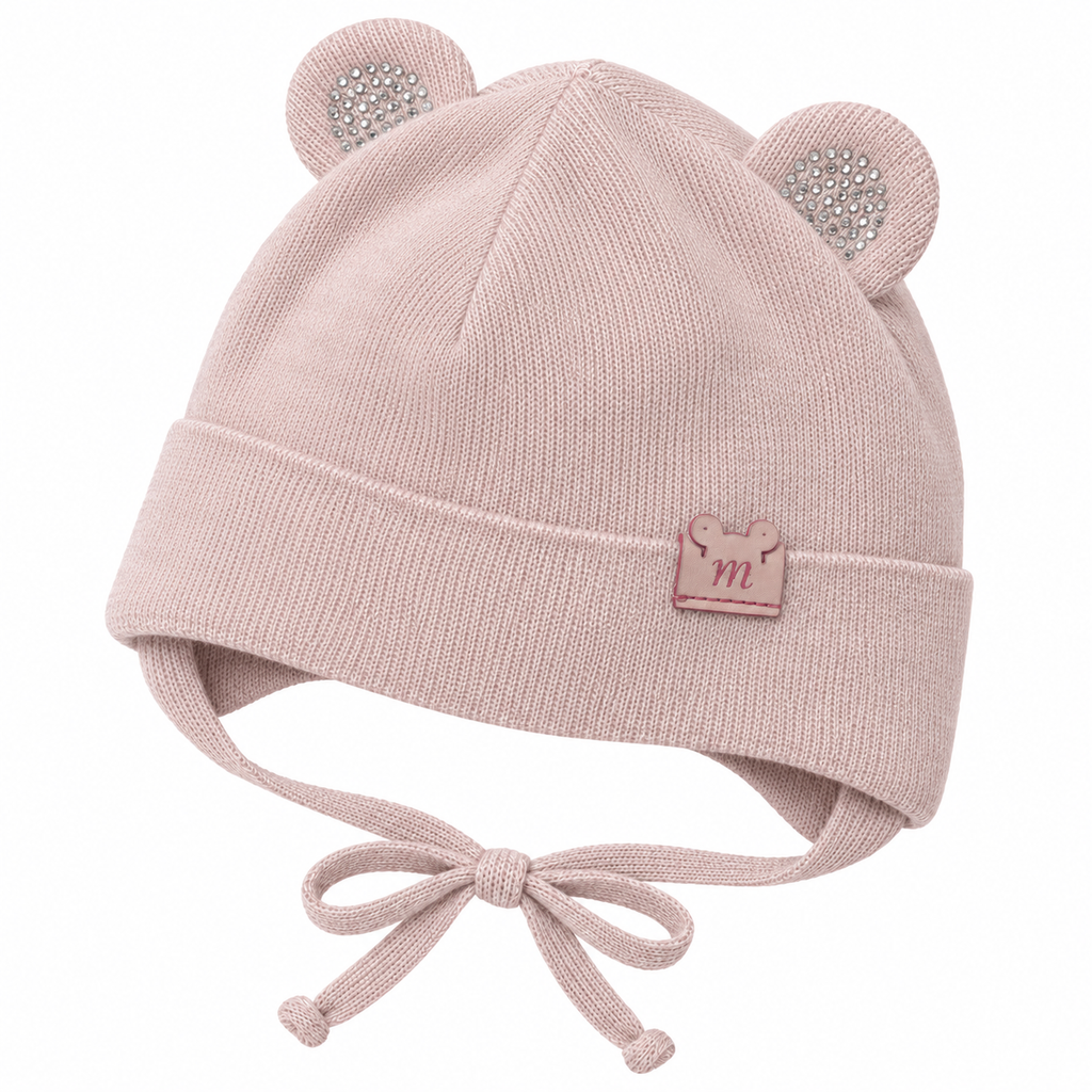 Dusty pink knitted baby girl cap with sparkle ears, fold-over cuff and bow ties – angled view