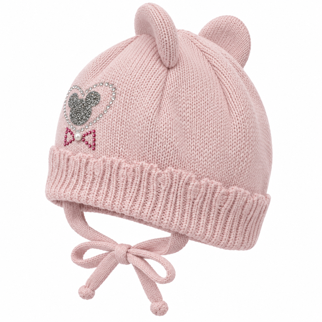 Dusty pink knitted baby girl cap with ears, ribbed cuff and tie strings – angled view