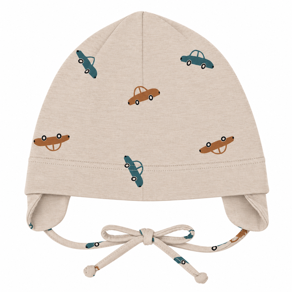 Boys beige cotton cap with car print and ear covers – flat lay product shot by MINIX Switzerland