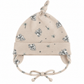Boys cotton cap with knotted top and elephant star print in beige – flat lay product shot