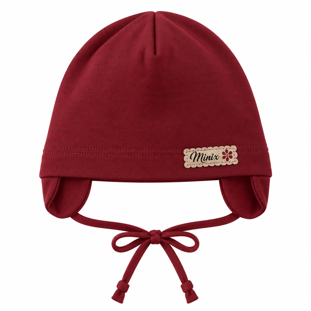 Burgundy girls cotton cap with ear flaps and tie strings – front view, MINIX Switzerland