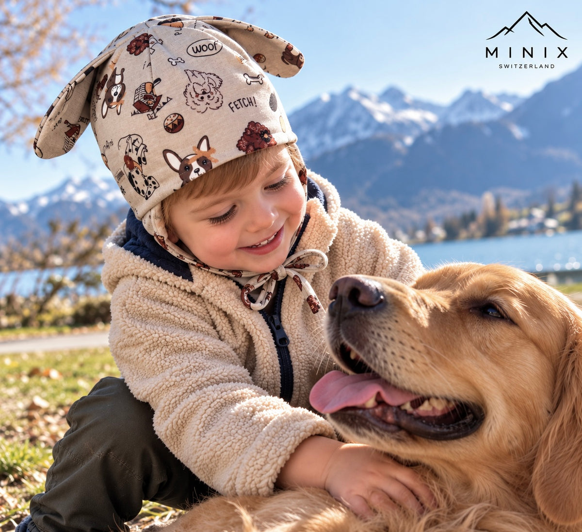 Boys beige cotton cap with floppy dog ears and Woof dog print – flat lay product shot by MINIX Switzerland