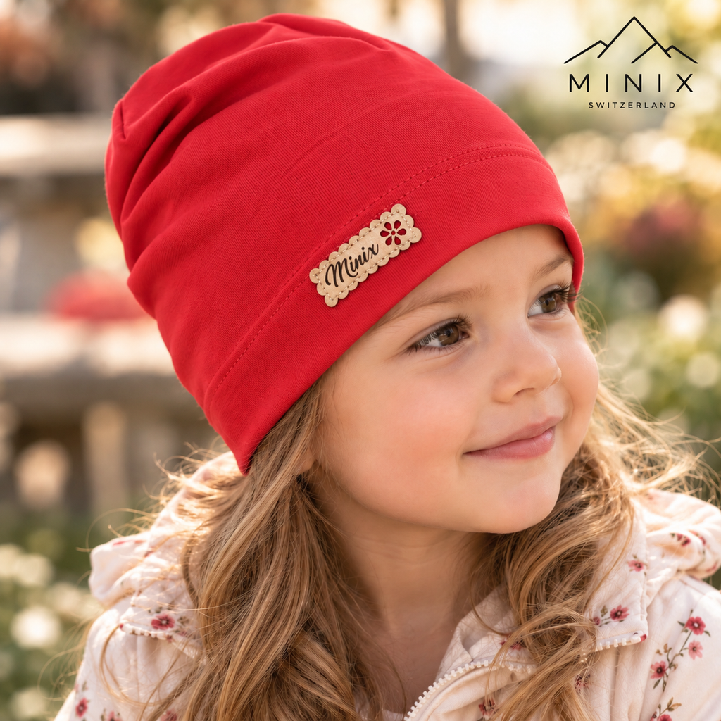 Coral cotton beanie for girls with flower label by MINIX Switzerland