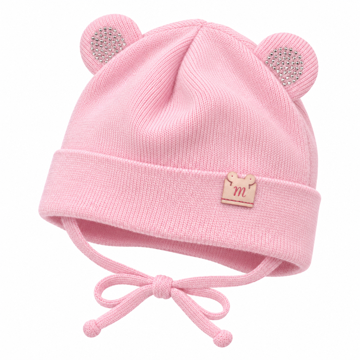 Pink knitted baby girl cap with sparkle ears, fold-over cuff and bow ties – angled view